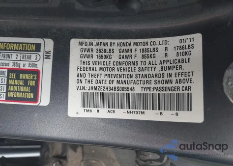 2011 Honda Insight from USA, damaged, VIN JHMZE2H34BS005548